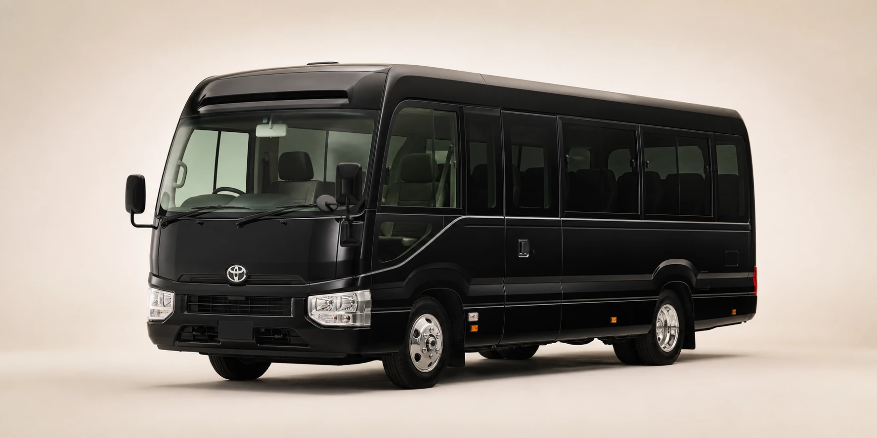 Black Toyota Coaster passenger minibus